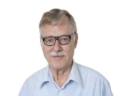 Man wearing glasses smiling